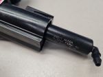 Форсунка омывателя фары правая