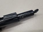 Форсунка омывателя фары правая