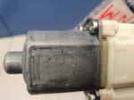 Моторчик стеклоподъёмника задний левый