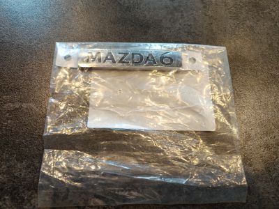 Эмблема крышки багажника для Mazda 2 DE 2007-2014