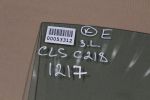 Стекло двери задней левой